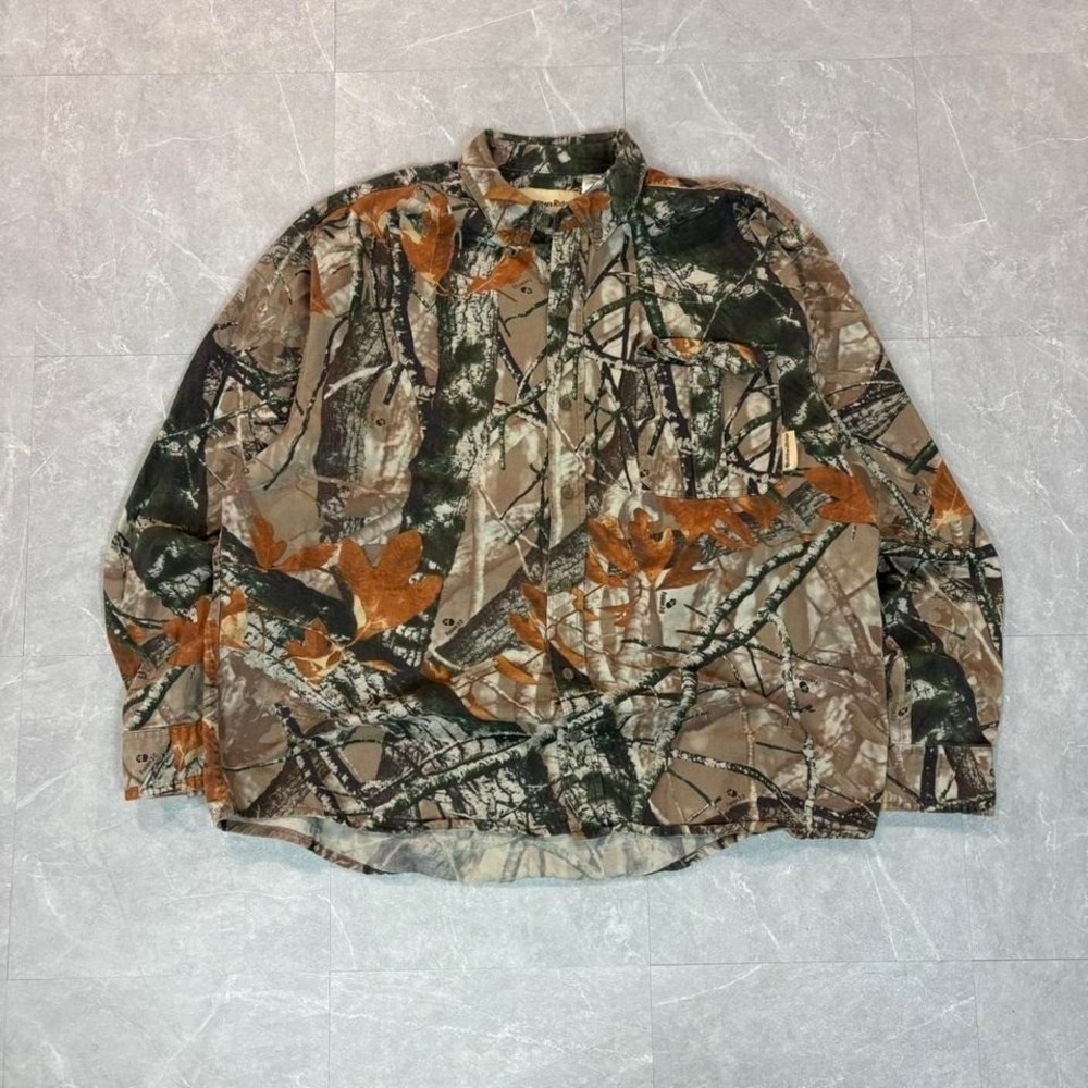 Brown and green camouflage flannel shirt with a‎ relaxed fit #grunge
